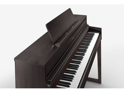 Roland HP704 Digital Piano click to zoom image