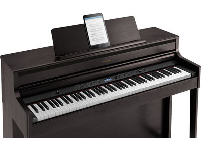 Roland HP704 Digital Piano click to zoom image